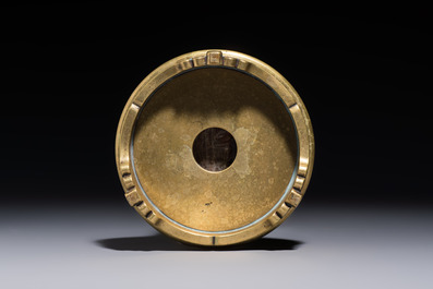 A Chinese bronze handled censer and stand, 17/18th C.