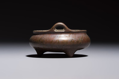 A Chinese bronze handled tripod censer, Yu Tang Jing Wan 玉堂精玩 mark, 17th C.