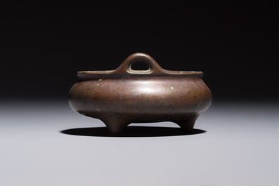 A Chinese bronze handled tripod censer, Yu Tang Jing Wan 玉堂精玩 mark, 17th C.