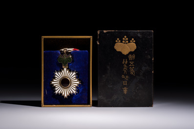A Japanese Order of the Rising Sun, Fifth Class, in its original lacquer box, Meiji, 19/20th C.