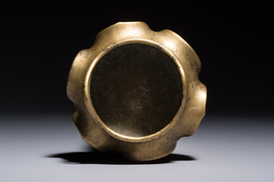 A Chinese bronze flower-shaped tripod censer with handles, Xuande mark, 19th C.