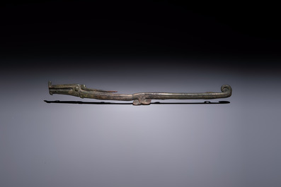 A large Chinese archaic bronze dragon-shaped fitting, early Western Zhou