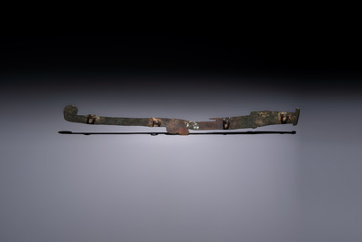 A large Chinese archaic bronze dragon-shaped fitting, early Western Zhou