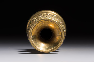 A small Chinese 'Lotus Scroll' incense tool vase, Qianlong mark, 18th C., and possibly of the period