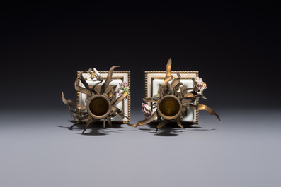 A pair of gilt silver and metal candlesticks with Chinese porcelain, European porcelain flowers, and marble bases, marked Boin-Taburet, late 19th C.