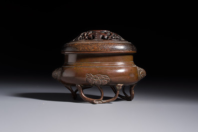 Two Chinese bronze censers, one with a wooden cover,  Ti An 惕庵 mark, 19th C.