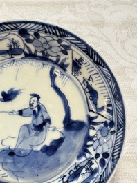 23 Chinese blue and white saucers with figural design, Yongzheng/Kangxi