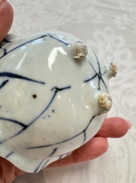 A Chinese Nanking water pot, a blue and white brush pot, a jarlet and a trick cup, Ming and later