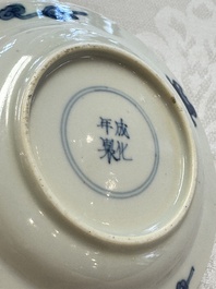 23 Chinese blue and white saucers with figural design, Yongzheng/Kangxi