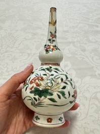 A Chinese famille verte rosewater sprinkler, a wucai jar and a Samson Paris verte-style covered ewer, 17/19th C.