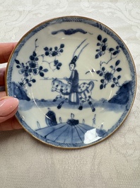 23 Chinese blue and white saucers with figural design, Yongzheng/Kangxi