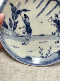 23 Chinese blue and white saucers with figural design, Yongzheng/Kangxi