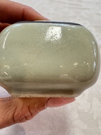 A Chinese Nanking water pot, a blue and white brush pot, a jarlet and a trick cup, Ming and later