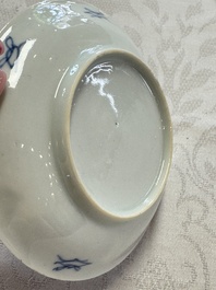 23 Chinese blue and white saucers with figural design, Yongzheng/Kangxi