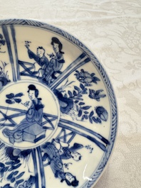 23 Chinese blue and white saucers with figural design, Yongzheng/Kangxi