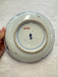 Seven Chinese blue and white plates with figural and floral design, 18/19th C.