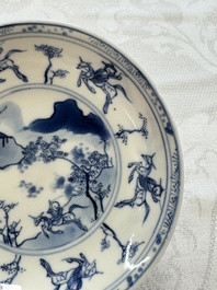 23 Chinese blue and white saucers with figural design, Yongzheng/Kangxi