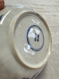 23 Chinese blue and white saucers with figural design, Yongzheng/Kangxi