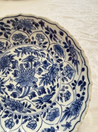 Seven Chinese blue and white plates with figural and floral design, 18/19th C.