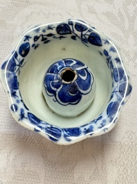 A Chinese Nanking water pot, a blue and white brush pot, a jarlet and a trick cup, Ming and later