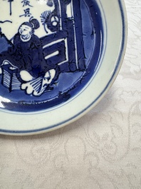 Seven Chinese blue and white plates with figural and floral design, 18/19th C.