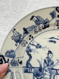 Seven Chinese blue and white plates with figural and floral design, 18/19th C.