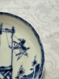23 Chinese blue and white saucers with figural design, Yongzheng/Kangxi