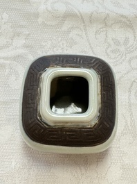 A Chinese Nanking water pot, a blue and white brush pot, a jarlet and a trick cup, Ming and later
