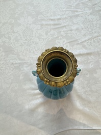 A pair of gilt-bronze-mounted Chinese turquoise-glazed vases, 19th C.