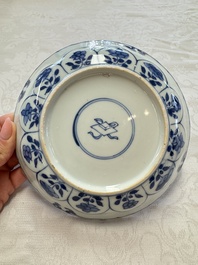 Seven Chinese blue and white plates with figural and floral design, 18/19th C.