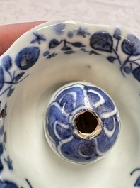 A Chinese Nanking water pot, a blue and white brush pot, a jarlet and a trick cup, Ming and later