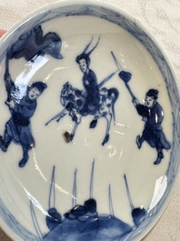 23 Chinese blue and white saucers with figural design, Yongzheng/Kangxi