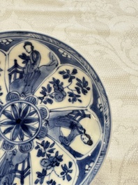 23 Chinese blue and white saucers with figural design, Yongzheng/Kangxi