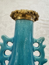 A pair of gilt-bronze-mounted Chinese turquoise-glazed vases, 19th C.