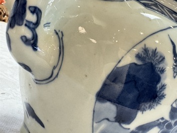 A Chinese blue and white 'Mythical Beasts' wine pot and cover, Transitional period