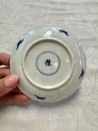 23 Chinese blue and white saucers with figural design, Yongzheng/Kangxi