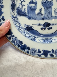 Seven Chinese blue and white plates with figural and floral design, 18/19th C.