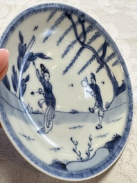 23 Chinese blue and white saucers with figural design, Yongzheng/Kangxi