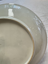 A Chinese famille rose 'Wine Drinking Sage and Attendant' dish, Yongzheng
