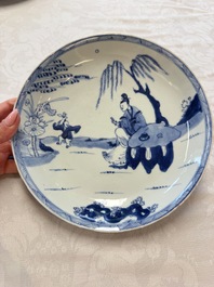 Seven Chinese blue and white plates with figural and floral design, 18/19th C.