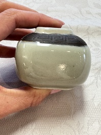 A Chinese Nanking water pot, a blue and white brush pot, a jarlet and a trick cup, Ming and later