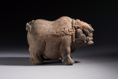 A Javanese terracotta boar-shaped money bank, probably Majapahit Kingdom, 15th C.
