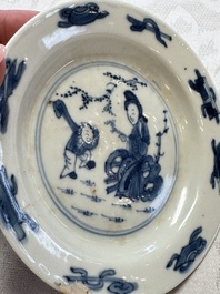 23 Chinese blue and white saucers with figural design, Yongzheng/Kangxi