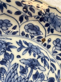 Seven Chinese blue and white plates with figural and floral design, 18/19th C.