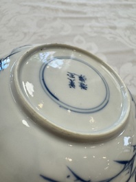 23 Chinese blue and white saucers with figural design, Yongzheng/Kangxi