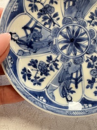 23 Chinese blue and white saucers with figural design, Yongzheng/Kangxi