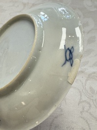 23 Chinese blue and white saucers with figural design, Yongzheng/Kangxi