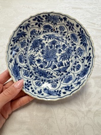 Seven Chinese blue and white plates with figural and floral design, 18/19th C.