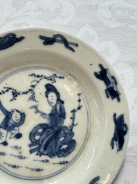 23 Chinese blue and white saucers with figural design, Yongzheng/Kangxi