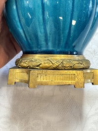 A pair of gilt-bronze-mounted Chinese turquoise-glazed vases, 19th C.